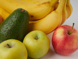 ripe yellow bananas on a white background       