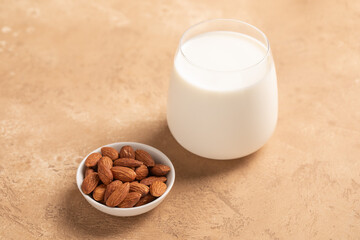 Almonds, a glass of milk. lactose free milk. Healthy food. Almond milk.