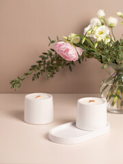 Gypsum handmade candles, a bouquet of flowers. Fragrant candles for the interior.