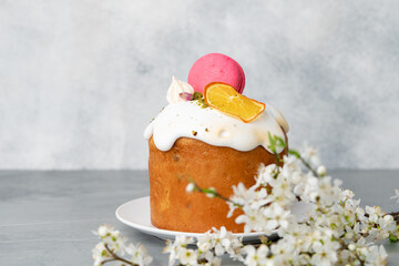 Beautiful Easter cake decorated with macarons cookie and dry orange piece