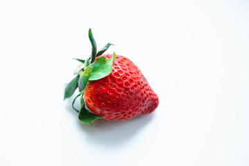 Ripe sweet fresh red strawberry on white background with copy space. Delicious summer berries.