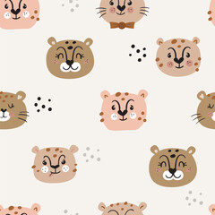 Seamless pattern with wild cheetah faces.
