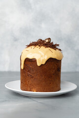Easter cake with nest decor on gray background