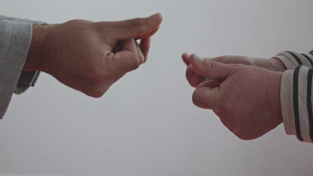 Gesture Hands snapping fingers performed by a man and a woman. Melody playing. Beating the rhythm