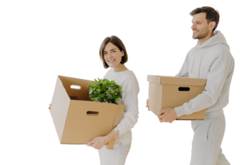 Family couple moving into new home with big boxes, busy unpacking belongings. Happy homeowners embracing domestic routine