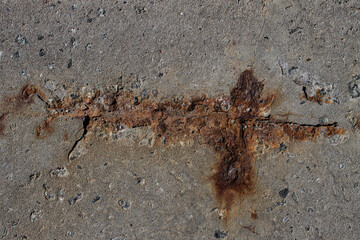 damaged concrete with rust. concrete with small stones