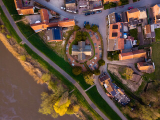 Top-Down Aerial View of Vlassenbroek, a Tiny Village on the Shore of the Scheldt River