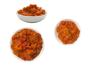 Vegetable stew in a bowl isolated on white background.