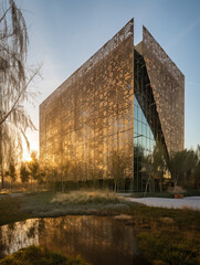 Eco-Friendly Building Bathed in Golden Sunlight - generative AI