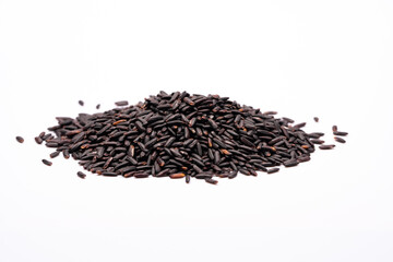 Raw black rice on the white background