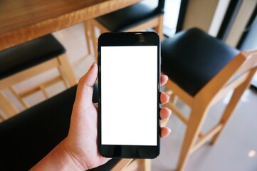 Close up of women's hands holding cell telephone blank copy space screen. smart phone with technology concept