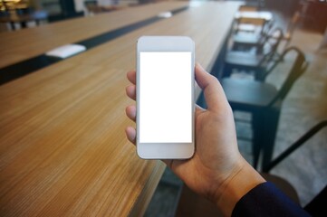 Close up of women's hands holding cell telephone blank copy space screen. smart phone with technology concept