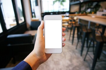 Close up of women's hands holding cell telephone blank copy space screen. smart phone with technology concept