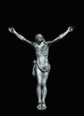 Fototapeta na wymiar The crucifixion of Jesus Christ against black background. Vertical image.