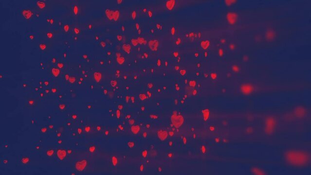Red glowing hearts kn black background 