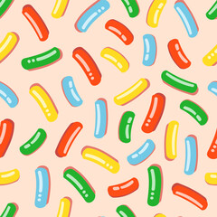 Seamless pattern with milk icing for donuts with lots of decorative bright sprinkles. Vector illustration of colorful candy sprinkles for fabrics, textures, wallpapers, posters, cards.