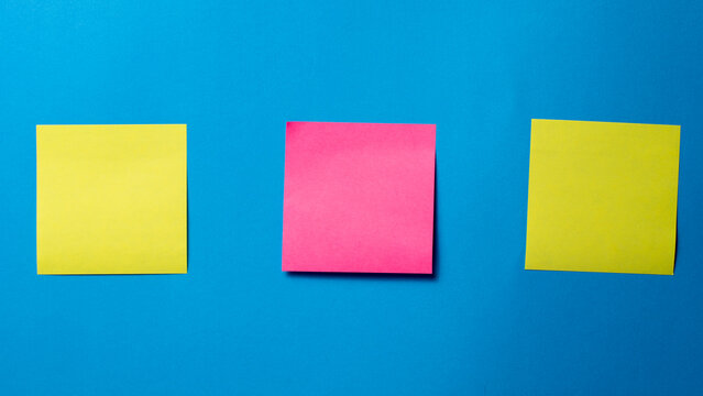 Blank Sticky Notes on Blue Background