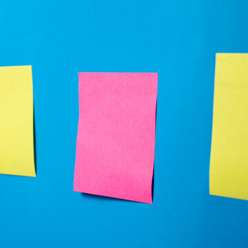 Blank Sticky Notes on Blue Background