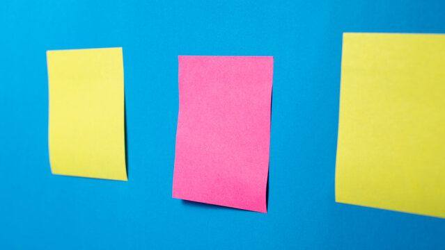 Blank Sticky Notes on Blue Background