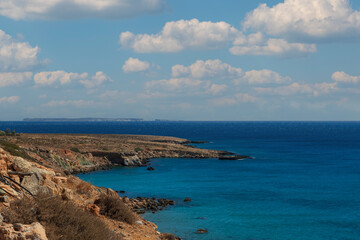 Beautiful landscape. Coast of the island of Crete - Greece area of Lerapetra Eden Rock. Beautiful sky at sunrise over the sea.