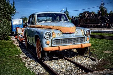old cool car, old warsaw driving a rail car, color. retro, vintage, motor, transport
