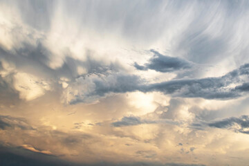sunset on shining on storm clouds