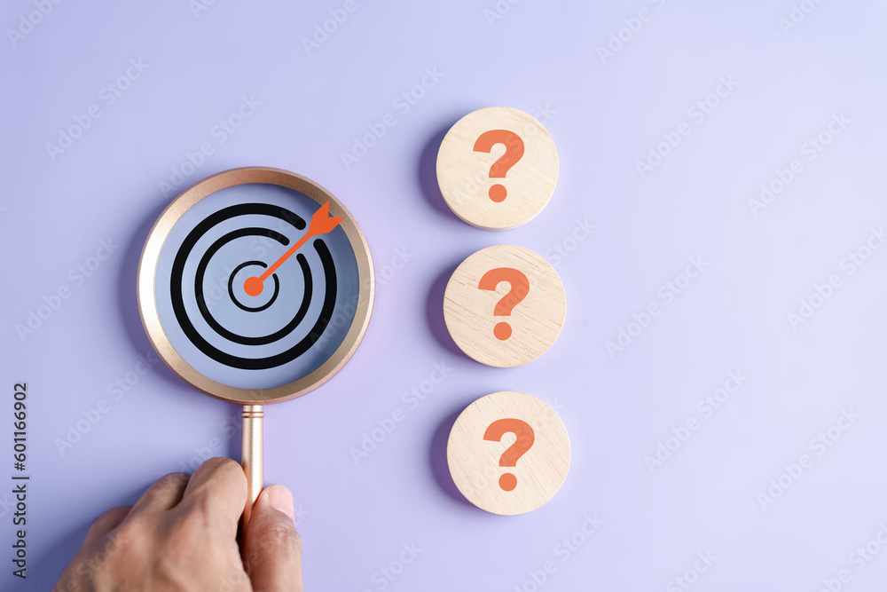 Poster Magnifier focus to target solution target which among question icon, successful business and thinking solution strategy concept.