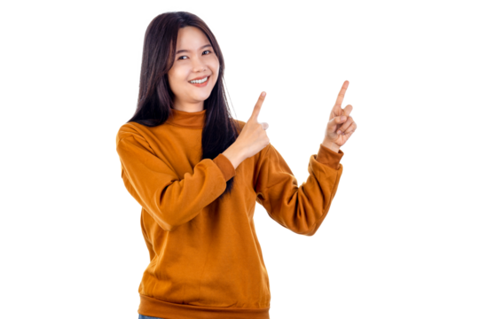 Young Asian woman raise hands pointing fingers up with smiling.
