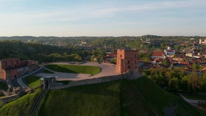 Areal footage of Gediminas tower in Vilnius Lithuania in sunrise 