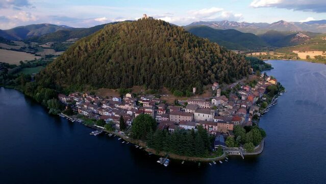 Most beautiful scenic Italian lakes - small picturesque lake Piediluco with colorful houses in Umbria, Terni province. Aerial drone video
