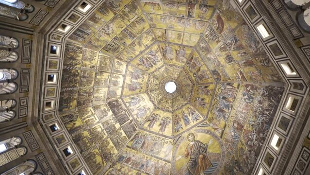 Rotating ceiling of the baptistry of il Duomo in Florence with gold paintings