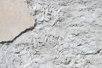 Concrete wall texture with cracks and scratches. Yellow and grey graphic materials	