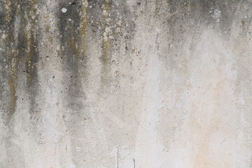Concrete wall texture with cracks and scratches. Yellow and grey graphic materials	