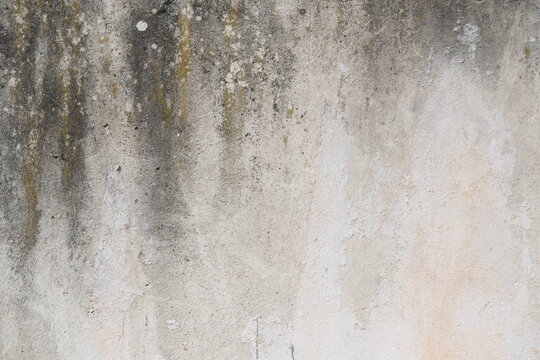 Concrete wall texture with cracks and scratches. Yellow and grey graphic materials	