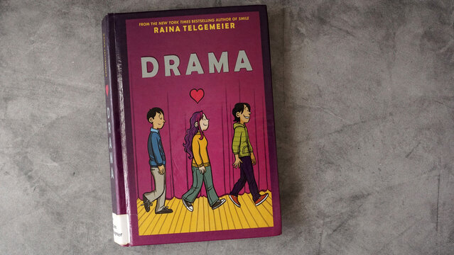 A copy of Raina Telgemeier's graphic novel, Drama. The book has landed on many banned book lists at schools and libraries.