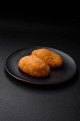 Delicious baked cutlet breaded with spices, salt and herbs