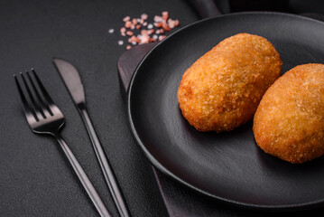 Delicious baked cutlet breaded with spices, salt and herbs