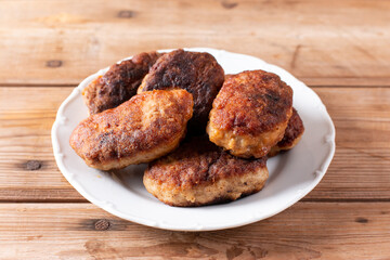 Minced Cutlets with Vegetables on a table. Horizontal
