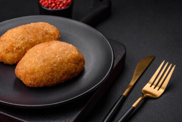 Delicious baked cutlet breaded with spices, salt and herbs