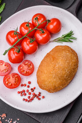 Delicious baked cutlet breaded with spices, salt and herbs