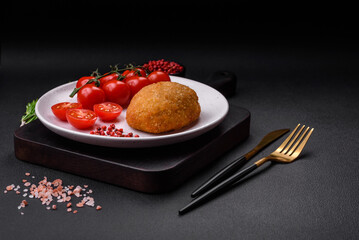 Delicious baked cutlet breaded with spices, salt and herbs