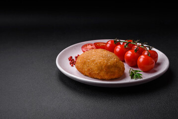 Delicious baked cutlet breaded with spices, salt and herbs