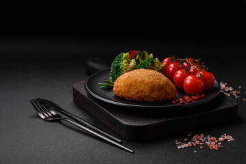 Delicious baked cutlet breaded with spices, salt and herbs
