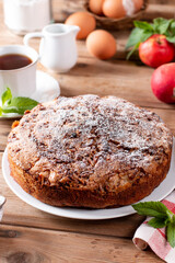 Clasic sponge cake, selective focus. Homemade pie on rustic wooden table