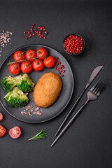 Delicious baked cutlet breaded with spices, salt and herbs