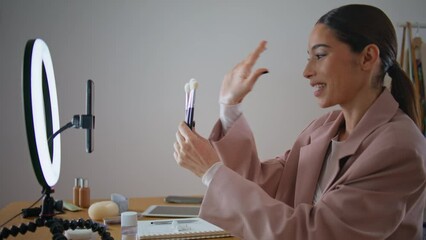 Excited media person talking internet vlog at home. Influencer streaming online