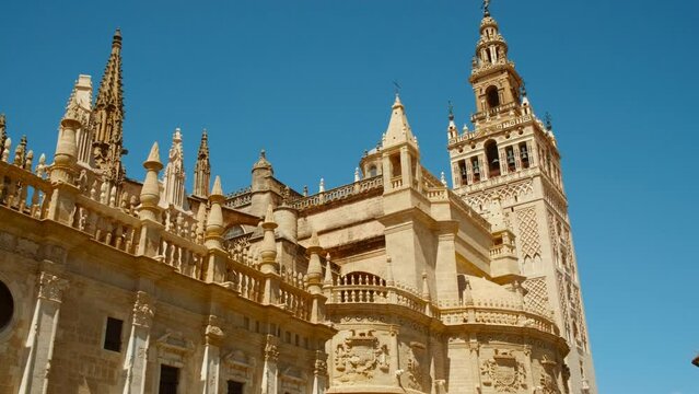 Seville Cathedral and Giralda, Seville, Andalusia, Spain, a majestic Gothic cathedral with the iconic bell tower showcasing rich history and art