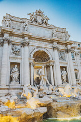 Fototapeta na wymiar The iconic Fontana di Trevi in Rome, a masterpiece of Baroque architecture, displaying grandeur against the hustle and bustle of the city.