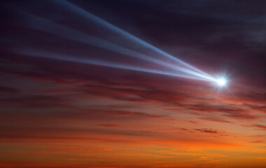Comet, asteroid, meteorite flying on the background of the evening sky. Glowing asteroid and tail of a falling comet. Elements of this image furnished by NASA.