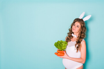 young attractive pregnant girl in a bunny suit